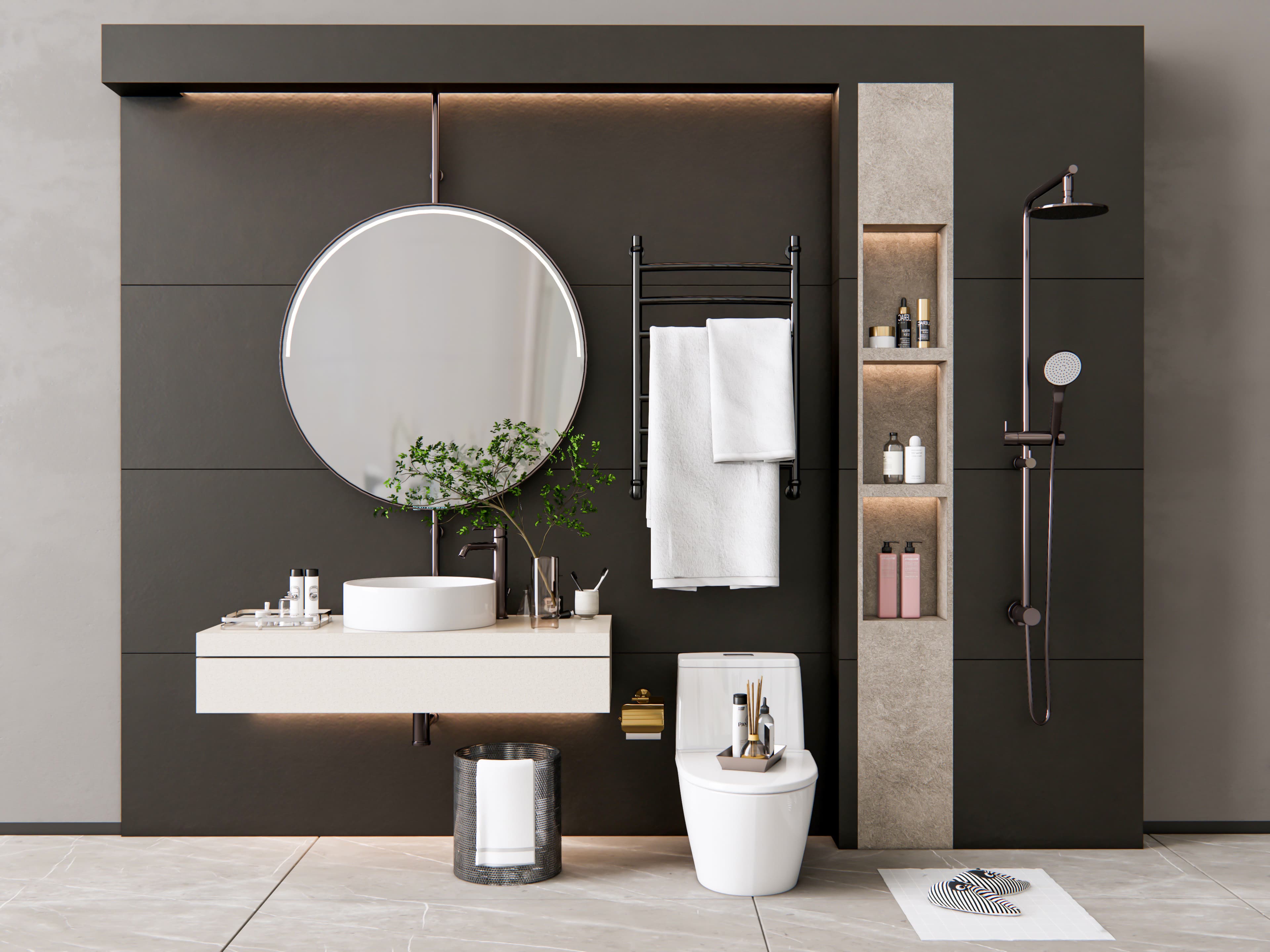 A modern bathroom vanity with a round mirror and vessel sink from Aurora Home Hardware Building Centre.